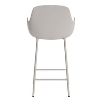 Light grey bar stool with a minimalist design and smooth, curved backrest.