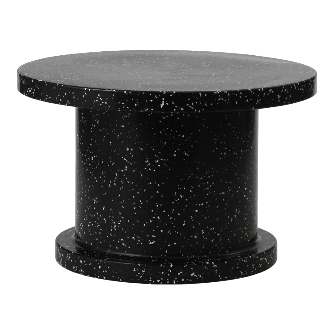 Round black table featuring a speckled pattern for a modern, minimalist look. Ideal for contemporary decor.