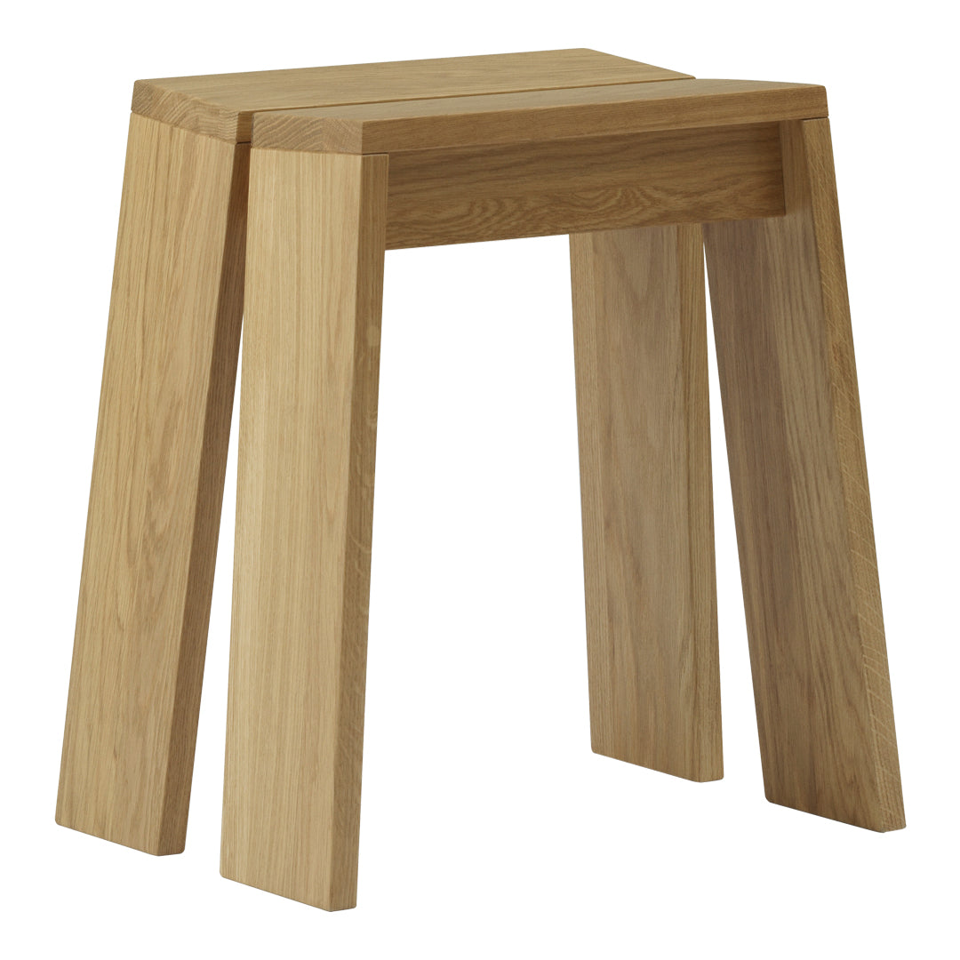 Natural wood stool in light oak finish with a minimalist design and smooth, straight lines. Perfect for modern decor.