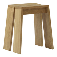 Natural wood stool in light oak finish with a minimalist design and smooth, straight lines. Perfect for modern decor.