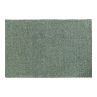 Soft green textured area rug with a subtle woven pattern, ideal for enhancing cozy spaces.