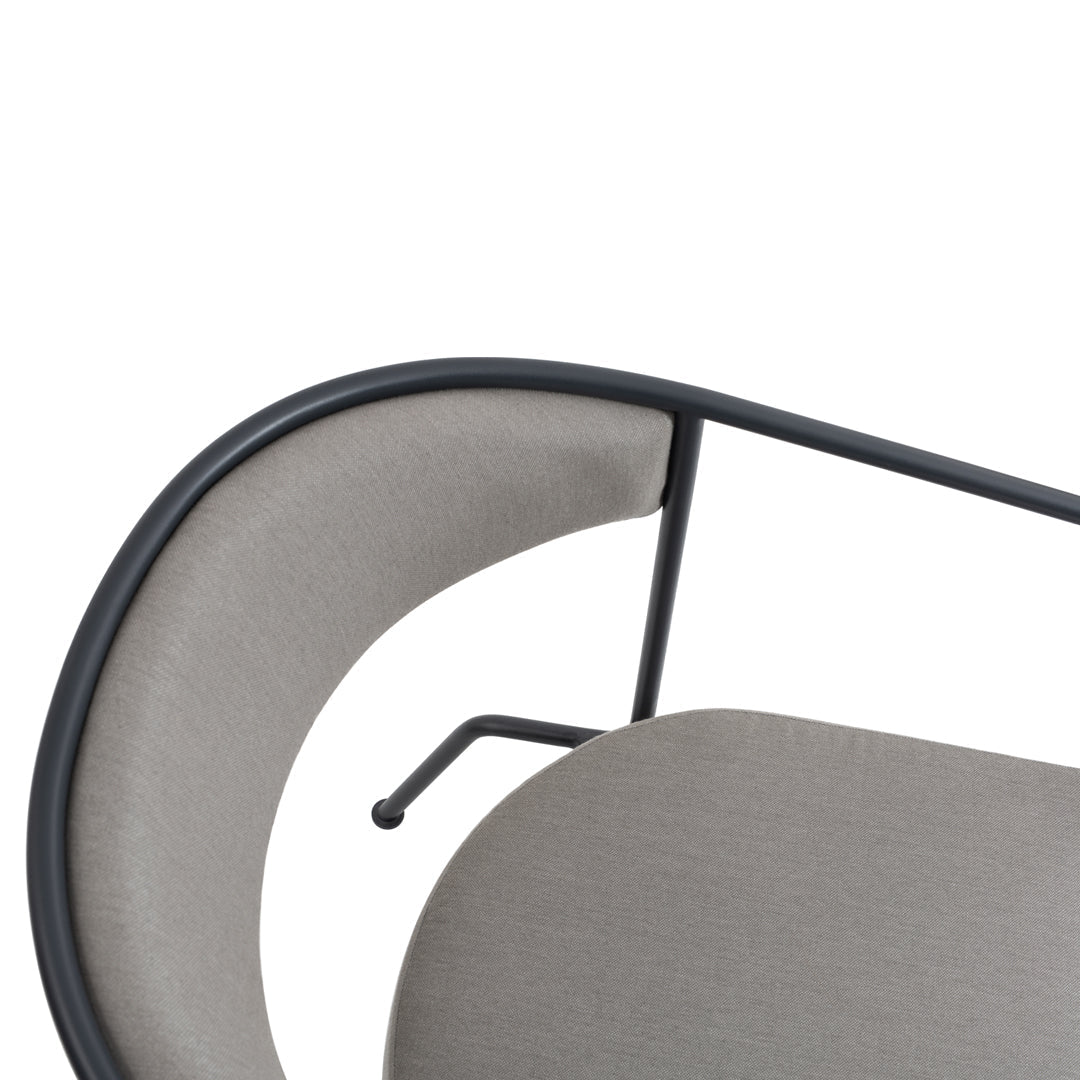 Gray upholstered chair with a sleek black metal frame and modern curved design. Perfect for contemporary interiors.