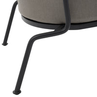 Stylish gray upholstered chair with sleek black metal legs, featuring a modern and minimalistic design.