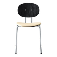 Black wood chair with a smooth beige seat and sleek chrome legs, featuring a minimalist design and modern aesthetic.