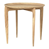 Natural wood finish round table with smooth, light oak color and elegant minimalist design.
