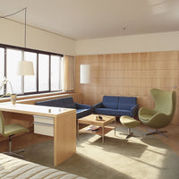 Modern living room featuring blue and green furniture with light wood accents and soft beige carpet.