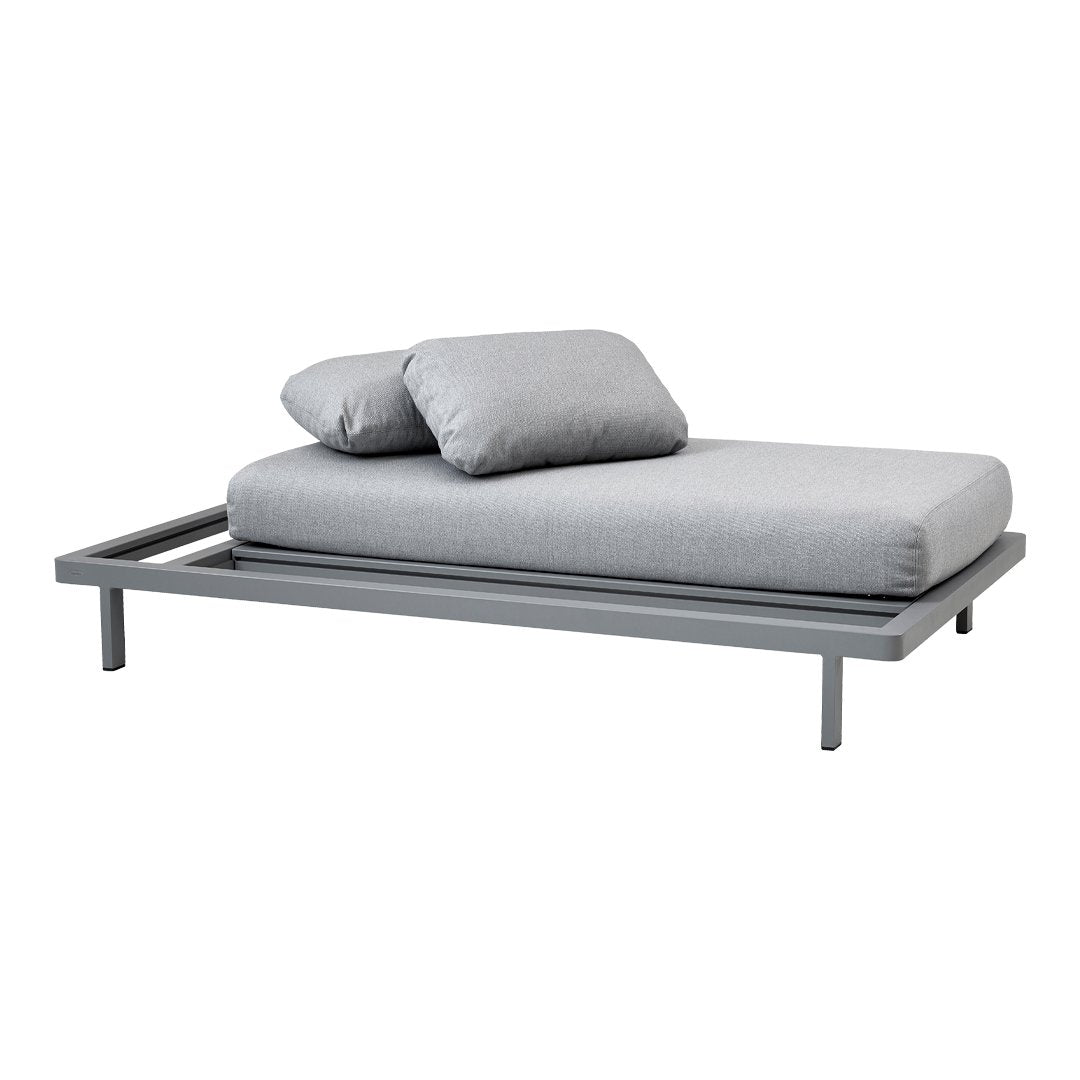 Light grey bed frame with matching cushions, featuring a sleek, minimalist design and modern aesthetic.