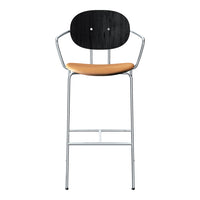 Modern bar stool featuring a sleek black wooden backrest and a tan upholstered seat, complemented by a chrome frame.