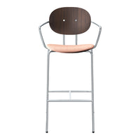 Modern bar stool featuring a dark wood backrest, soft peach seat, and chrome metal legs for a stylish look.
