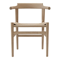 Natural wood chair with a smooth, light oak finish and woven seat, showcasing a minimalistic design.