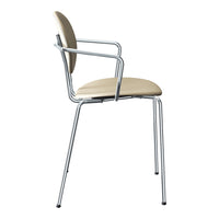 Beige upholstered chair with chrome legs, featuring a smooth, minimalist design perfect for modern decor.