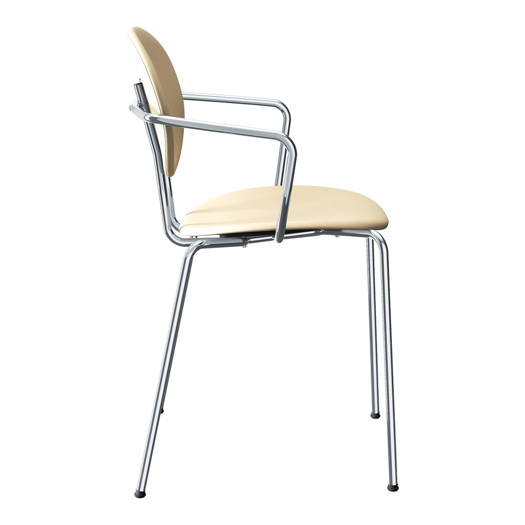 Beige padded chair with chrome arms and legs, featuring a minimalist design and smooth, curved lines.