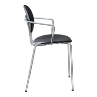 Black upholstered chair with chrome metal frame and sleek, modern design. Ideal for contemporary spaces.