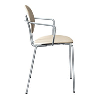 Beige upholstered chair with a sleek chrome frame, featuring a modern minimalist design. Perfect for any decor.