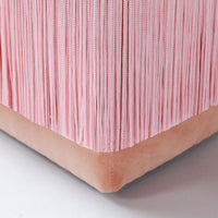 Pink fringe texture with soft blush base in a stylish modern design. Perfect for adding a pop of color to any space.