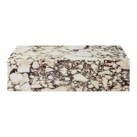 Cream and brown marble block with intricate veining and natural patterns for elegant decor.