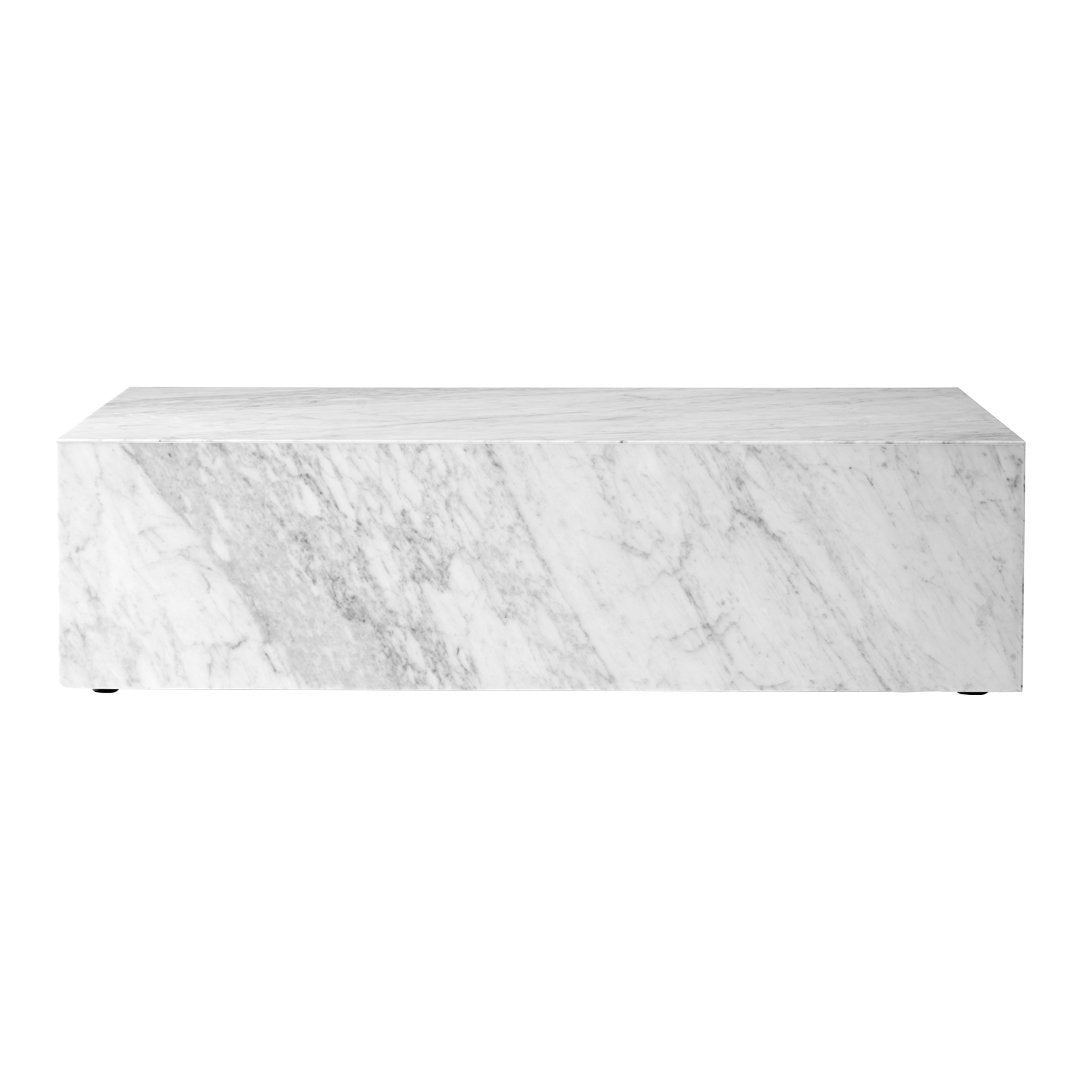 White marble coffee table with subtle gray veining and a smooth, polished finish, adding elegance to any space.