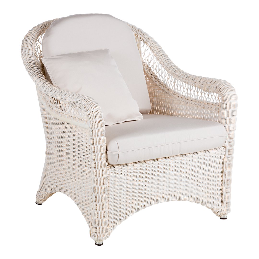 "White wicker chair with soft cream cushions, featuring a smooth, textured pattern and elegant, curved design."