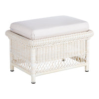 White woven ottoman with a light beige cushion, featuring a textured pattern and elegant design. Perfect for any decor.