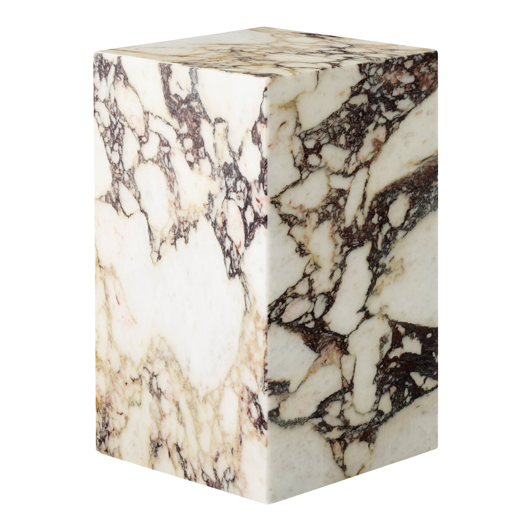 "Natural white marble block with intricate brown and gold veining patterns, perfect for home decor or furniture."