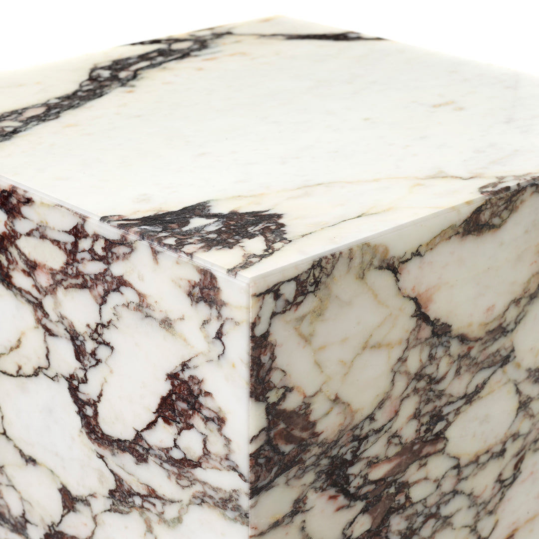 Cream and white marble with dark red and gray veining, showcasing a unique, elegant pattern. Perfect for modern decor.