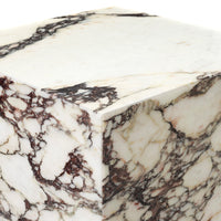 Cream and white marble with dark red and gray veining, showcasing a unique, elegant pattern. Perfect for modern decor.