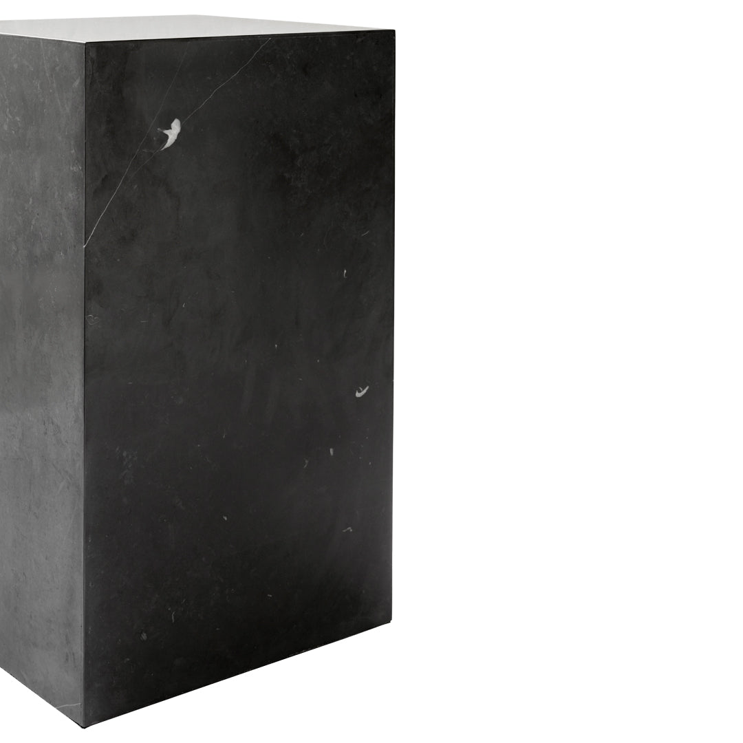 Black marble pedestal with subtle veining and a smooth, polished surface. Ideal for modern decor.