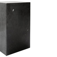 Black marble pedestal with subtle veining and a smooth, polished surface. Ideal for modern decor.