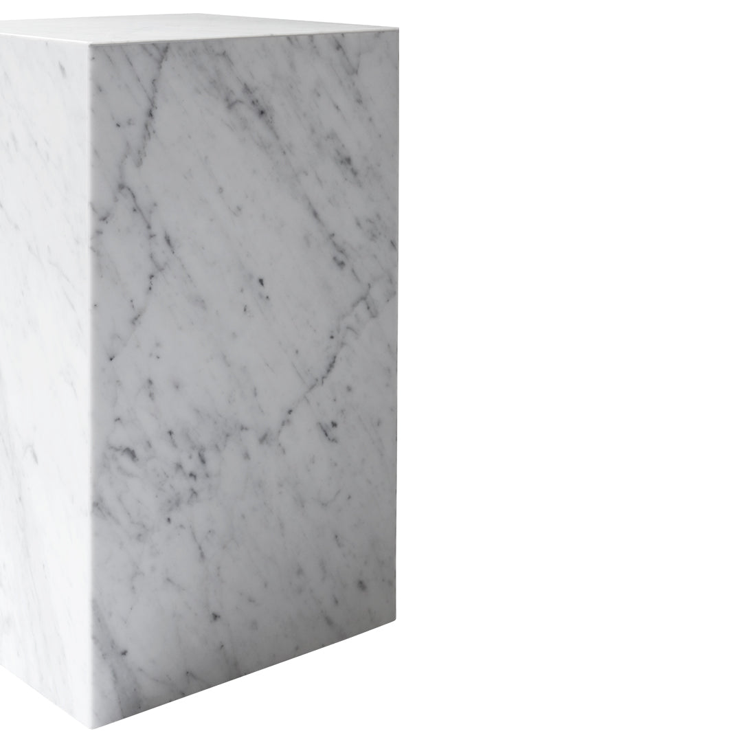 White marble stand with subtle grey veining and a polished finish, perfect for modern decor.