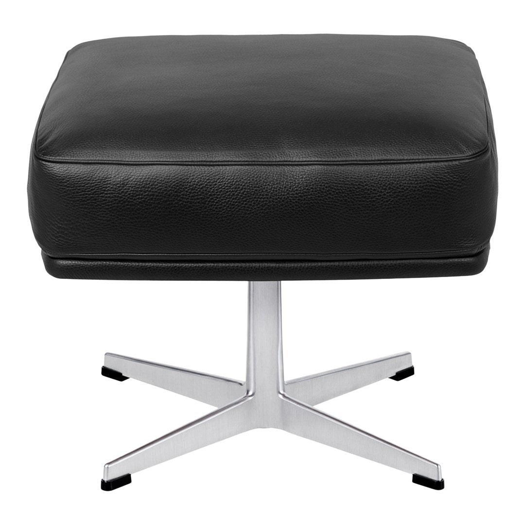 Black leather ottoman with a sleek chrome base, featuring a minimalist square design. Perfect for modern decor.