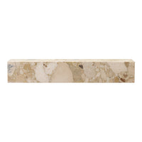 Beige stone block with light and dark speckles, showcasing a natural, earthy pattern ideal for various decor styles.