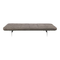 Gray tufted surface with sleek metal legs, ideal for modern decor. Simple, versatile design for any space.