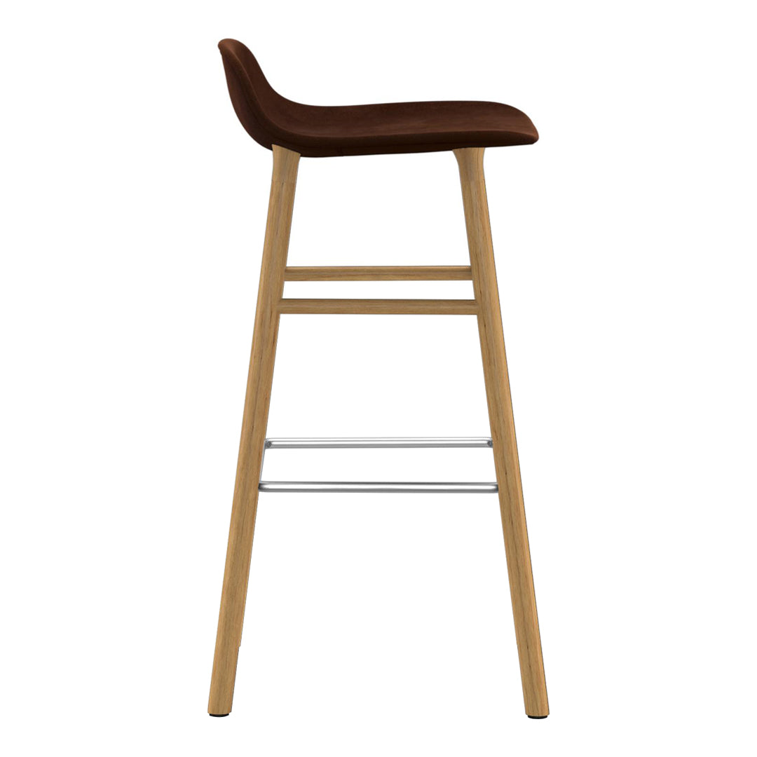 Stylish bar stool featuring a rich brown seat and natural wood legs with a sleek silver footrest.
