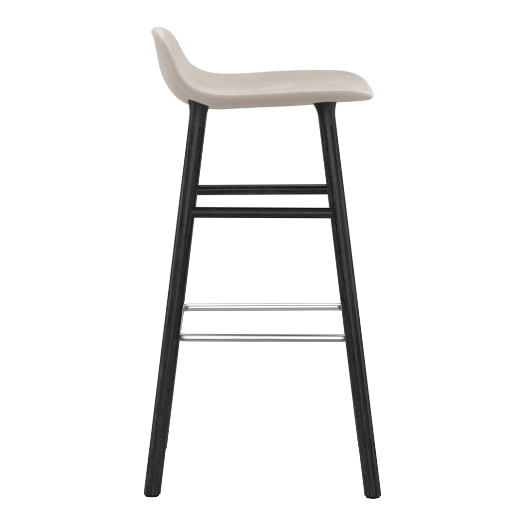 Neutral beige seat with sleek black wooden legs and minimalist design, perfect for modern spaces.