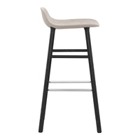 Neutral beige seat with sleek black wooden legs and minimalist design, perfect for modern spaces.