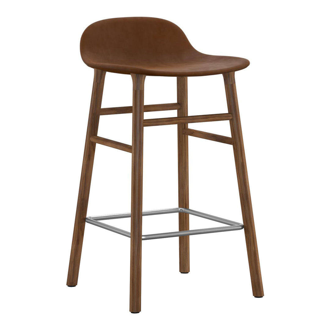 Brown wooden bar stool with a smooth, curved seat and a sleek metal footrest. Modern, minimalist design.