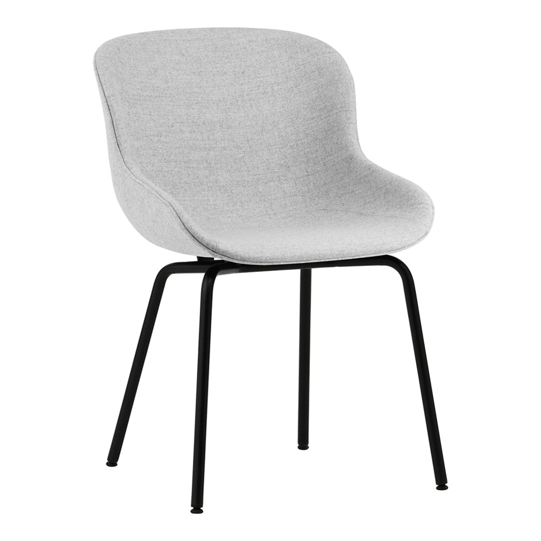 Stylish light gray upholstered chair with a smooth surface and sleek black metal legs.