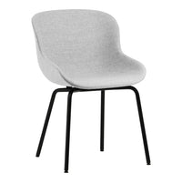 Stylish light gray upholstered chair with a smooth surface and sleek black metal legs.