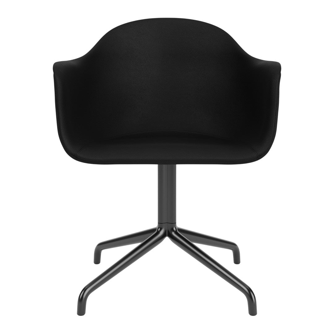 Black upholstered chair with a minimalist design and sleek metal base. Perfect for modern decor.
