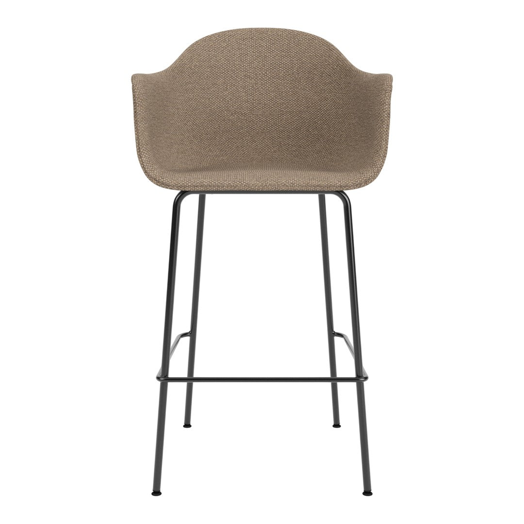Tan textured bar stool with a sleek black metal frame, perfect for modern decor.