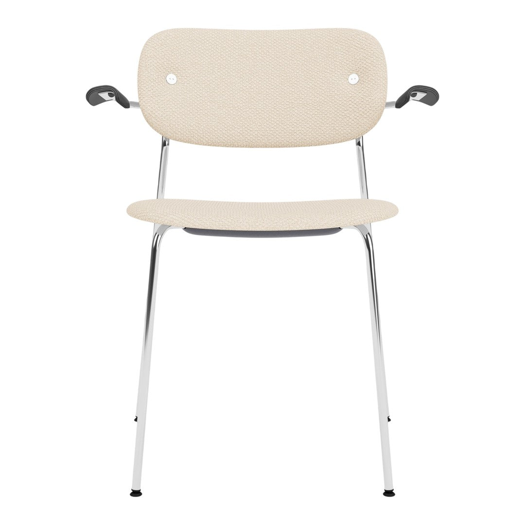 Beige upholstered chair with chrome legs and minimalist design, featuring a simple and clean aesthetic.