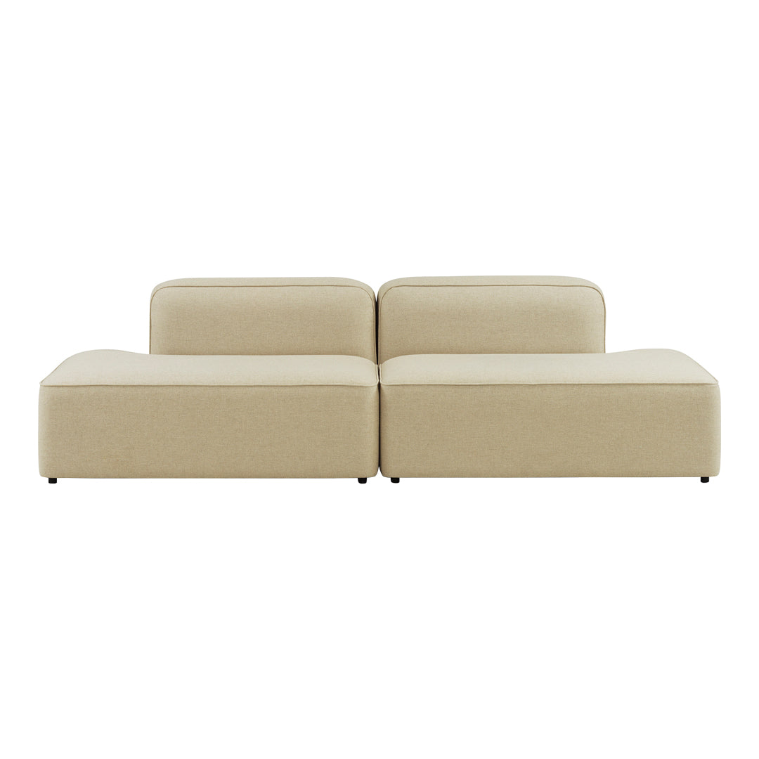 Beige modular sofa with a sleek, minimalist design and smooth, textured upholstery. Ideal for modern living spaces.