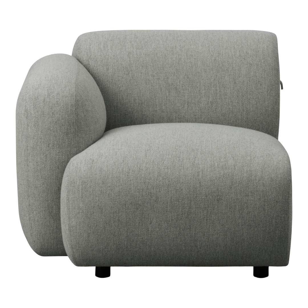 Gray upholstered chair with a smooth texture and rounded, modern design. Ideal for contemporary interiors.