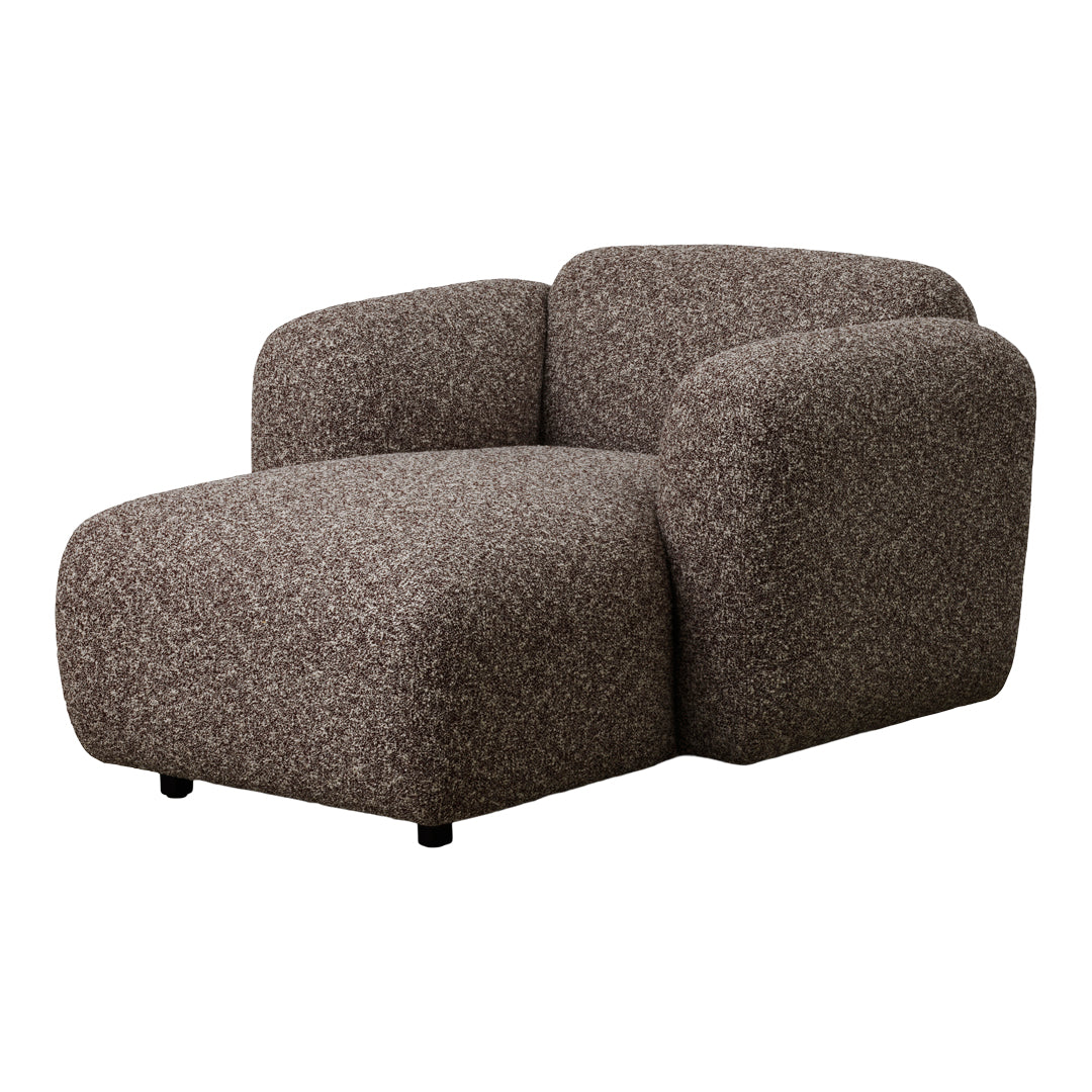Textured brown upholstered chaise lounge with a modern, minimalist design. Perfect for stylish interiors.