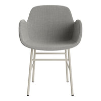Gray upholstered chair with a smooth texture and minimalist white metal legs. Modern and stylish design.
