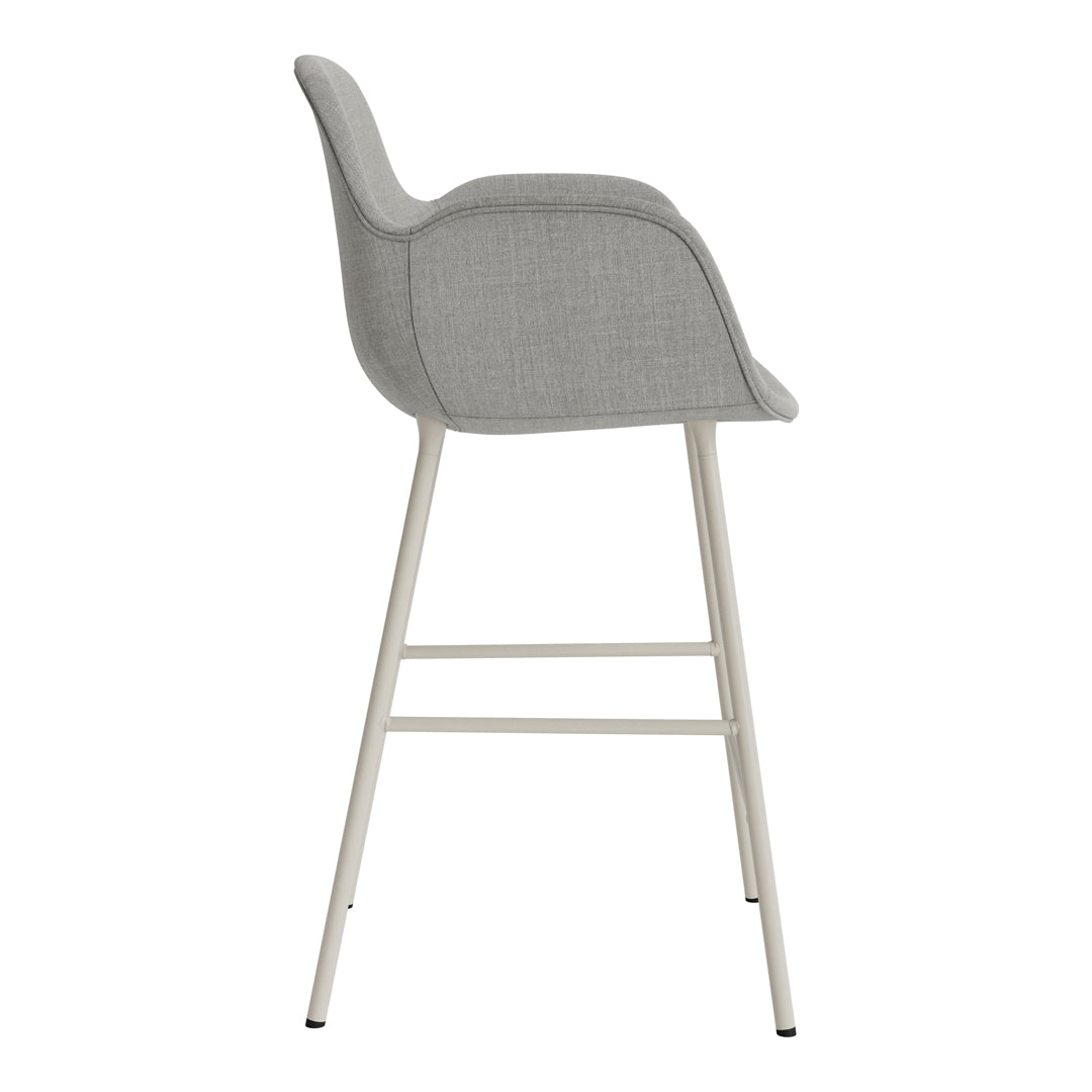 Gray upholstered bar stool with a smooth, minimalist design and light metal legs. Perfect for modern decor.