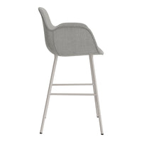 Gray upholstered bar chair with a sleek design and minimalist white metal legs.