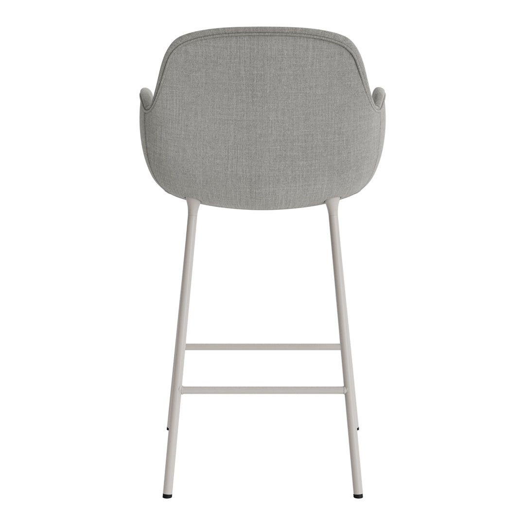 Light gray upholstered bar stool with a smooth, minimalist design and sleek metal legs. Perfect for modern interiors.