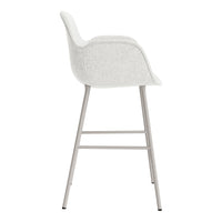 Light grey upholstered bar stool with a smooth texture and minimalist design, featuring a chrome base.