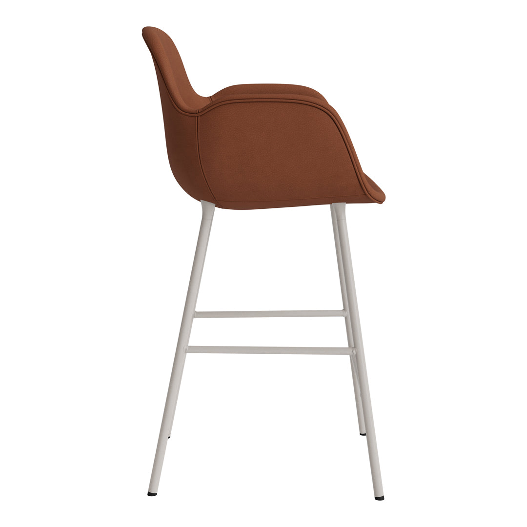 Brown upholstered chair with a sleek silver metal frame, featuring a smooth, modern design.